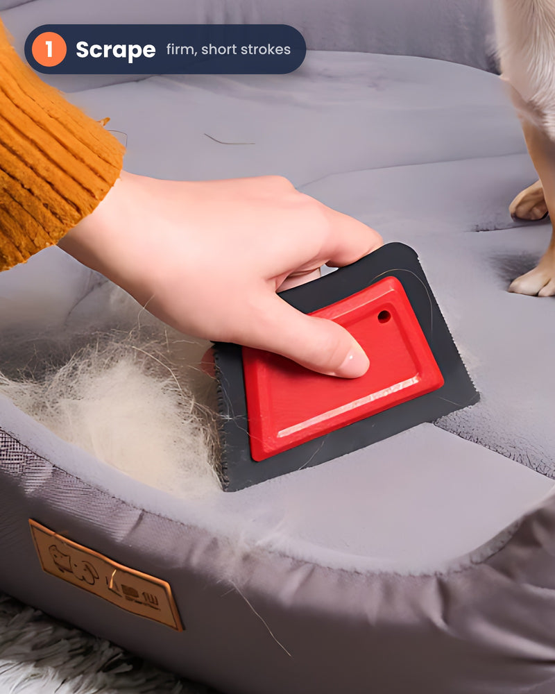 Dragging the pet hair remover across a couch cushion