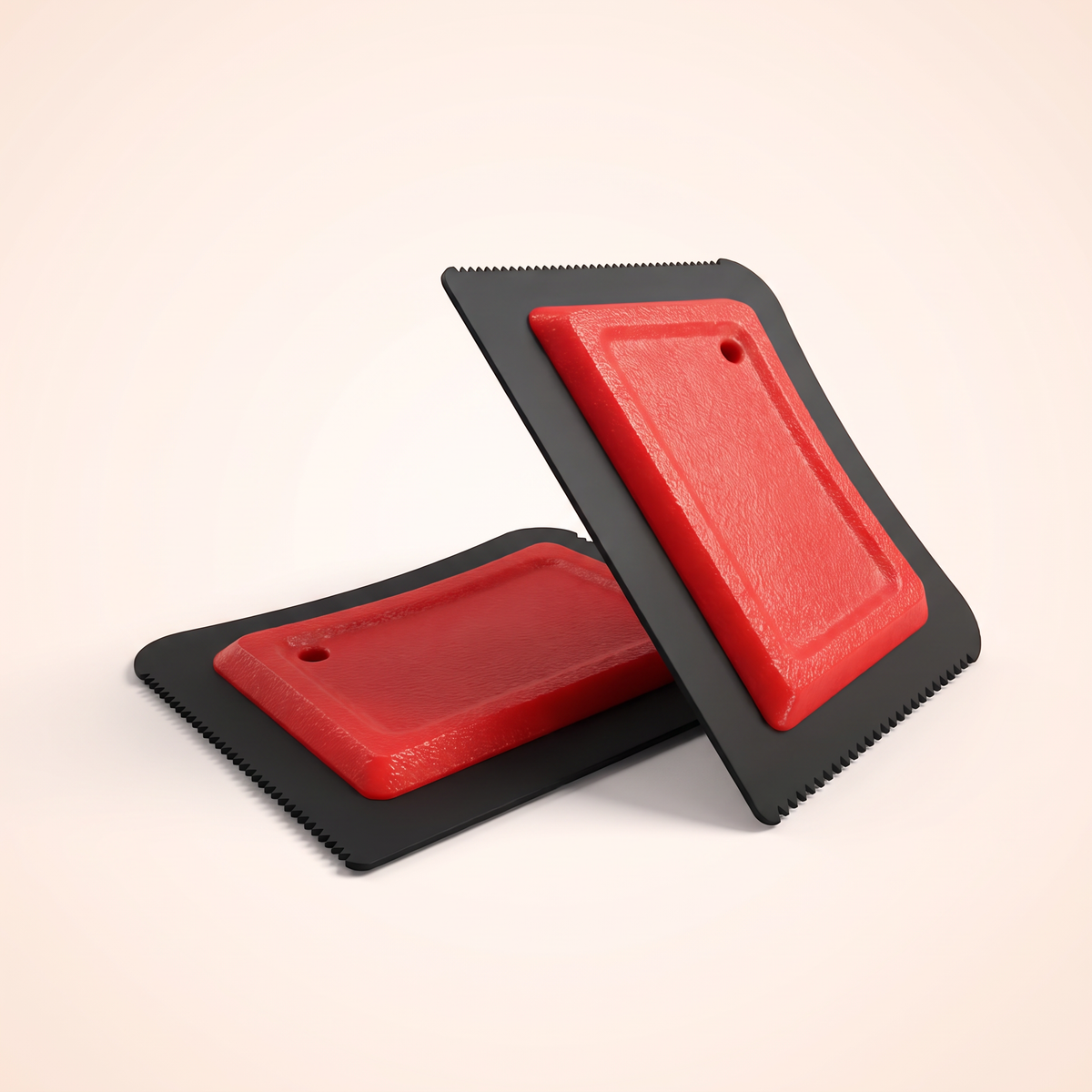 Two PawNest pet hair removers together, front view and side profile